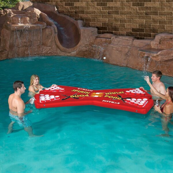 Photo of Pittman Splash PongX 4 person blow up raft in pool with 2 males and 2 females playing the game