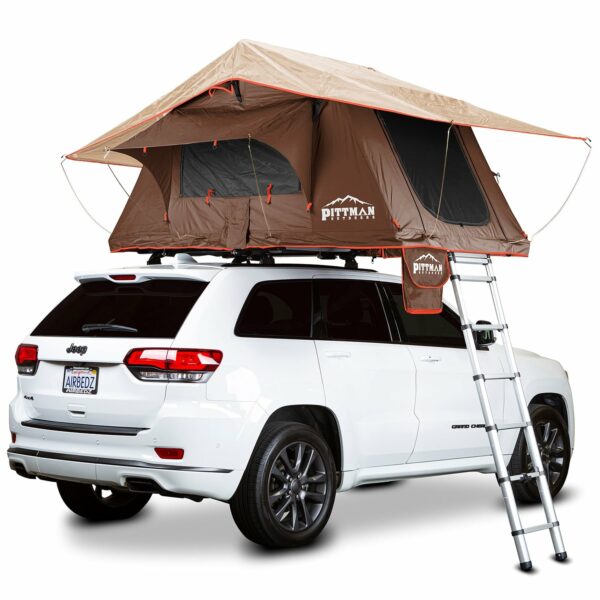Photo of Pittman 1.9 Softshell Tent Coffee Brown with Orange Trim opened on a white Jeep SUV